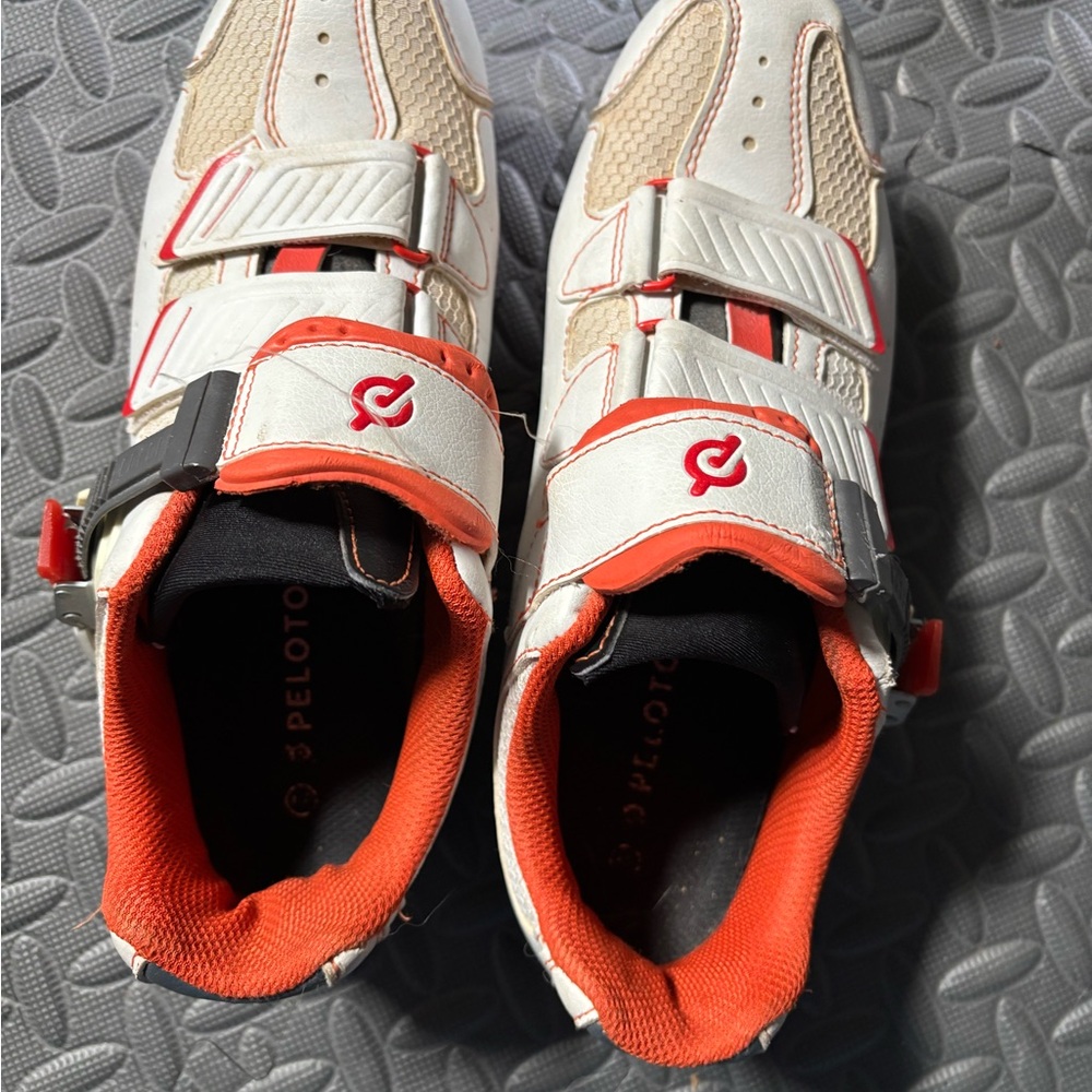 Peloton Cycling Shoes with Orange and White Highlights